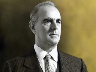 Οι μεγάλοι εθνικοί δρόμοι, ο εξηλεκτρισμός της χώρας, τα περισσότερα υδροηλεκτρικά και αρδευτικά έργα, η εξασφάλιση επαρκούς ύδρευσης της πρωτεύουσας από την Υλίκη και το Μόρνο, το Ανατολικό Αεροδρόμιο Ελληνικού, η εκβιομηχάνιση της Θεσσαλονίκης, τα διυλιστήρια πετρελαίου, τα εργοστάσια ζάχαρης και λιπασμάτων, το εργοστάσιο αλουμινίου, η βιομηχανική εκμετάλλευση του ορυκτού πλούτου, οι βιομηχανικές ζώνες, τα μεγάλα ναυπηγεία, τα ξενοδοχεία «Ξενία», το «Χίλτον», ο Αστέρας Βουλιαγμένης, το Μον Παρνές, το Γενικό Κρατικό Νοσοκομείο Αθηνών και ένα σωρό άλλες υποδομές φέρουν τη σφραγίδα της τότε πρωθυπουργίας του.